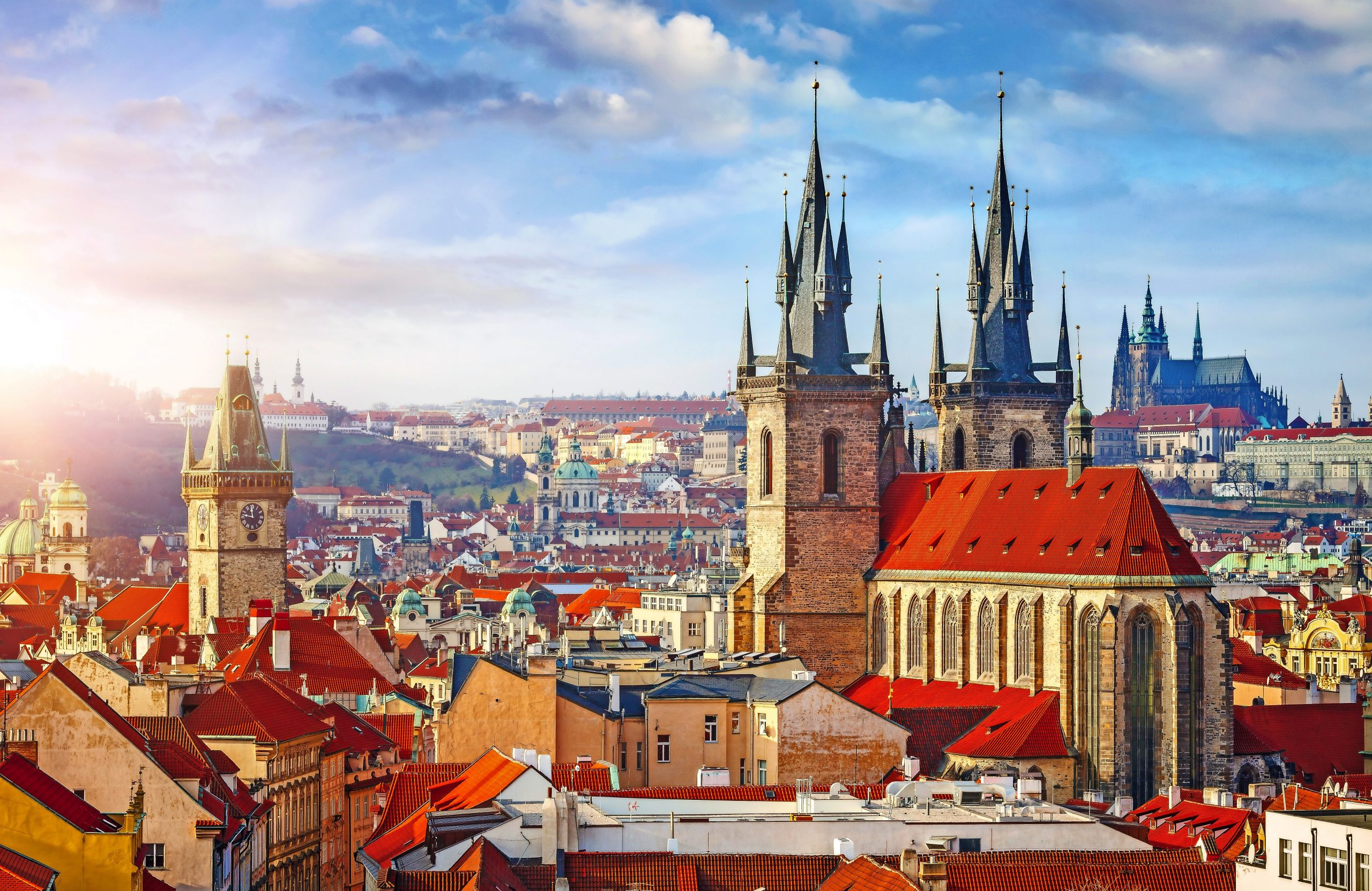 High spires towers of Tyn church in Prague city Our Lady